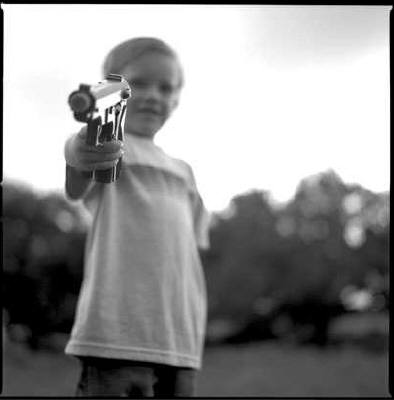 Kid with gun